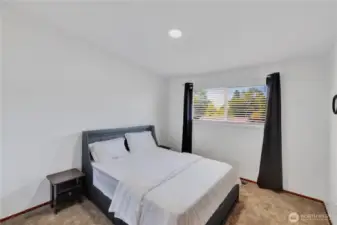 Additional Upstairs Bedroom with beautiful back yard views.