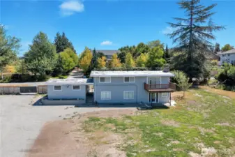 Back yard view with ample parking.