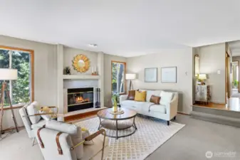 Light floods the living area and surrounded by greenery makes for a wonderful retreat.