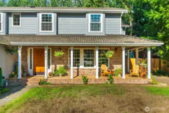 Covered, wrap around front porch