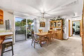 Dining room with view of fenced backyard