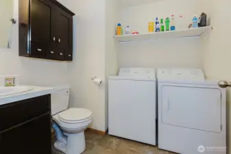 half bathroom with laundry