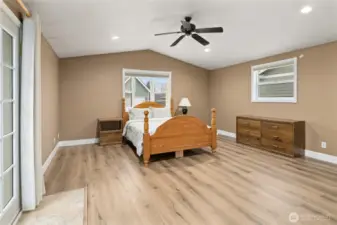 Main Floor Primary bedroom 18"x16' with French Doors that exit to the back deck.