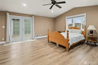 Primary bedroom with celling fan.