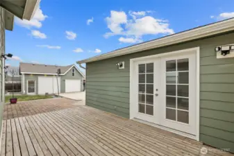 Back Deck that leads you to the back yard.  Great aera for entertaining or enjoying privacy.