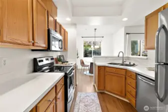 Spacious galley kitchen with newer stainless steel appliances