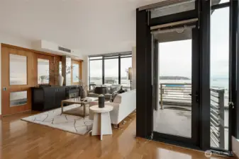 Living area with fireplace and view deck