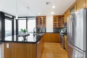 Open and spacious Kitchen with granite countertops