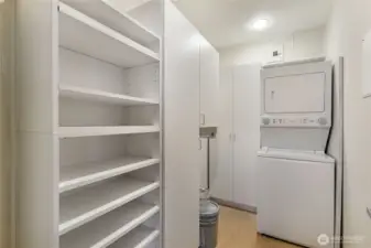Laundry room with pantry storage cabinet