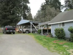 Driveway to large parking area