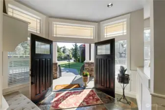 Did I say wonderful entry way into home with a slate landing double front doors and room for all your shoes and coats as you come and go.  See how light and bright it is with beautiful windows and coverings.