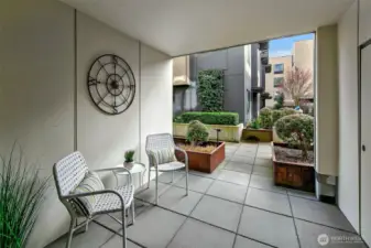 Private outdoor space off lower bedroom connects to courtyard.