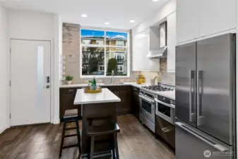 We love a floorplan where you walk into living space instead of at a stairwell. This living space is light and bright and open with high ceilings and large windows.