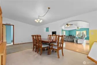 Dining room adjacent to large bright family room