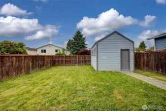 Sunny Fenced Backyard