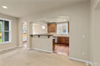 View into kitchen from living room space.