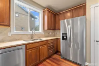 Hardwood flooring in kitchen as well.