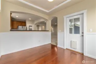 Breakfast nook with entry into backyard patio and deck.