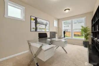 Virtually staged downstairs bedroom or optional office space.