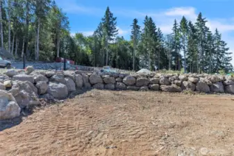 Rock wall at building site