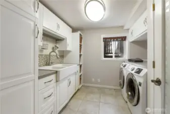 Luxe downstairs laundry room- ample storage