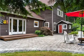 Lovely mature landscaping and a fire pit. Tell your friends to bring the S'mores!
