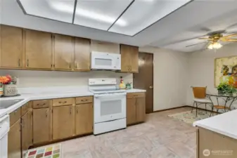The kitchen is roomy plus the area benefits from a solar tube....