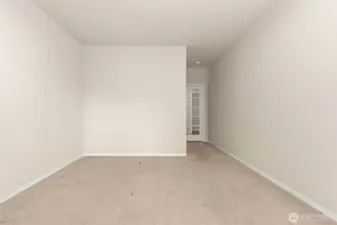 Downstairs bedroom with glass door