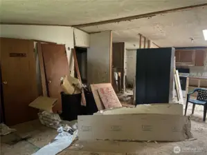 Living room, open concept with kitchen.