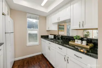 Updated kitchen with pass through to dining & easy flow view to living room