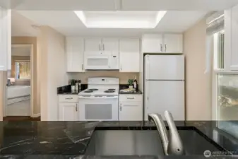 Marble counter tops, deep stainless sink & upgraded cabinetry