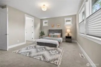 Clean, inviting bedroom space with room to spread out