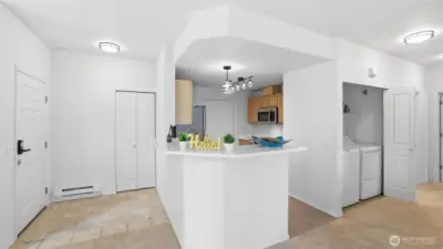 Welcoming kitchen peninsula creates the ideal space for entertaining or everyday living