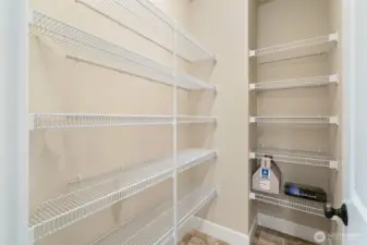 Costco-sized pantry in the kitchen helps to keep everything accessible
