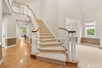 The grand staircase leads you upstairs to even more living space