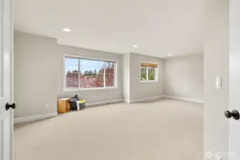 Double-door entry into the huge multi-purpose bonus room on the upper level