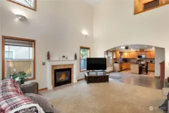 Family Room with high soaring high ceilings and plenty of natural light!