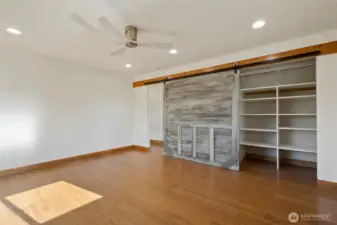 Bonus room upstairs closet with barn door