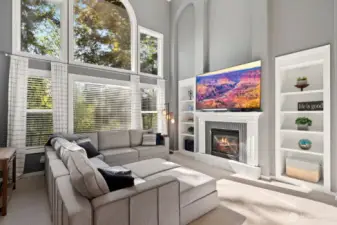 Soaring ceilings, generously sized windows & cozy gas fireplace!