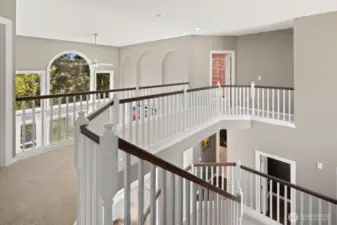 Open skyway from one wing of the upper floor to the other.