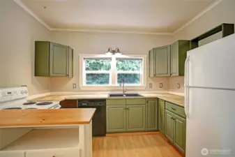 Updated kitchen w/ butcher block counters.