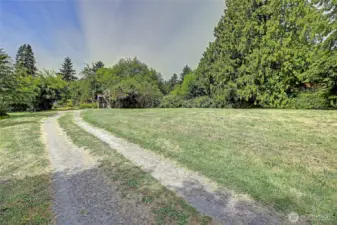 Private drive into your 1 acre property!