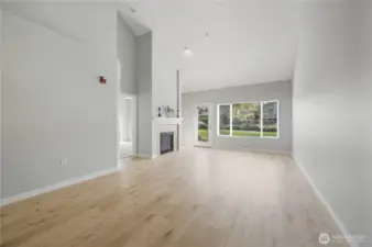 Great room with glass door to backyard
