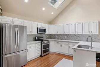 Kitchen w/ new appliances, quartz countertops, mosaic backsplash