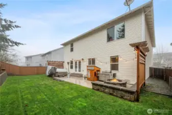 Backyard Oasis featuring a Gas Firepit and Relaxing Jacuzzi