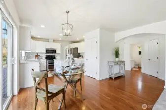 Beautiful hardwood floors flow throughout much of the main level, adding warmth and continuity to the open living spaces.