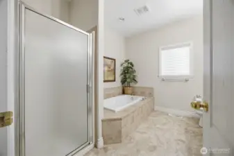 on suite bath with separate shower & tub