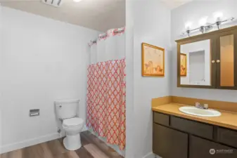 Full bathroom with laundry
