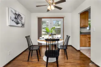 dining room splits the kitchen from the living rm and hallway leading to bedrooms & Full bath