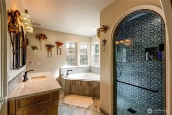 Newly renovated primary bathroom complete with oversize soak tub and extra large master shower.
